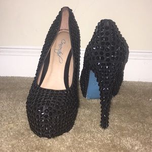 A all black , black stoned shoe by conceited